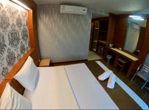 Letto o letti in una camera di Andaman Resort