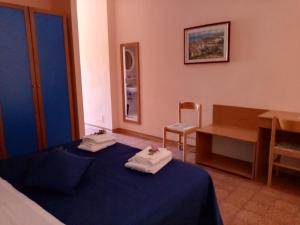 Postel nebo postele na pokoji v ubytování La Feluca