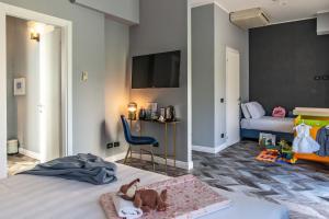 Voodi või voodid majutusasutuse Bloom Hotel Rome toas