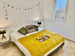 Postel nebo postele na pokoji v ubytování Nouveauté - L'Oasis - T3 - 70 M2 - Jacuzzi