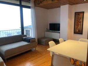 Μια τηλεόραση ή/και κέντρο ψυχαγωγίας στο Apartamento en Puigcerda