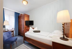 Postel nebo postele na pokoji v ubytování Design-Boutique Hotel Vosteen