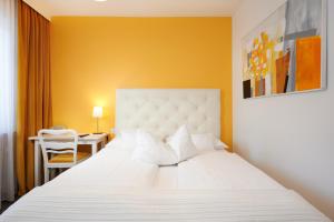 Postel nebo postele na pokoji v ubytování Design-Boutique Hotel Vosteen
