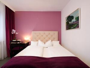 Postel nebo postele na pokoji v ubytování Design-Boutique Hotel Vosteen