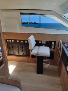 a view of the control room of a boat at BOAT & BREAKFAST LUCRETIA, LUXURY yacht in Àrbatax
