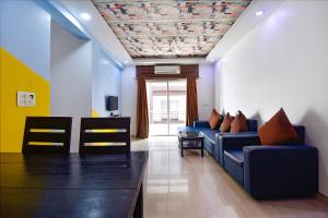 FabHotel Ocean View Apartment - Nr Dabolim Airport的休息区