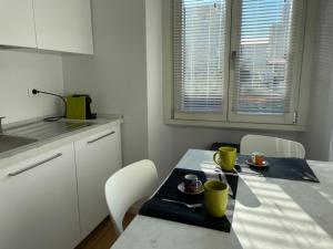 A kitchen or kitchenette at Appartamento bomboniera via Marghera 37 Még 2 kép