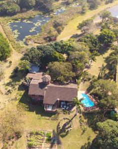 an aerial view of a house with a swimming pool at Secret Sithela in Port Edward