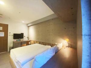 TV a/nebo společenská místnost v ubytování M Taipei Hotel