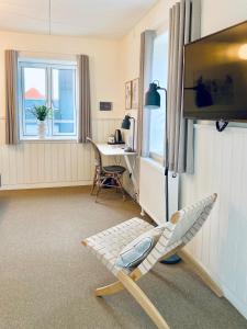 TV a/nebo společenská místnost v ubytování Hotel Marie