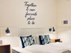 Postel nebo postele na pokoji v ubytování Hotel Marie