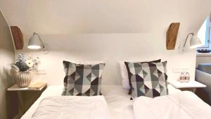 Postel nebo postele na pokoji v ubytování Hotel Marie