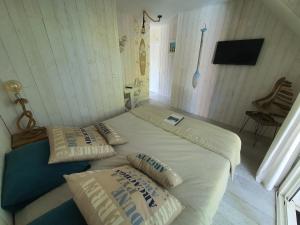 Postel nebo postele na pokoji v ubytování Villa Caraîbes