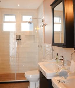 Um banheiro em Vila Pugliesi Hotel Boutique