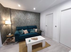 A seating area at Apartamento en Alicante La Casa Azul