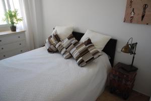 A bed or beds in a room at reina sofia 45