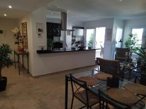 A kitchen or kitchenette at reina sofia 45