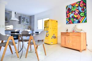 A cozinha ou cozinha compacta de L’appartement - Jardin Secret
