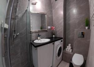 Koupelna v ubytování Apartament Loftowy Wypoczynek GoldAir + 28 fotografií
