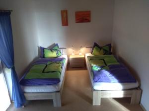Cama o camas de una habitación en Reiterhof Hexental