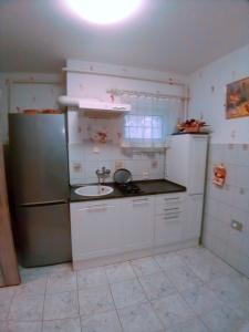 Kuchyňa alebo kuchynka v ubytovaní Valloris Apartments