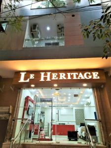 a store front of a furniture store with a lit sign at Hotel Le Heritage , Nizamudin Railway Station in New Delhi