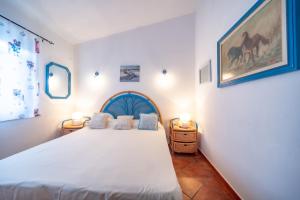 Ένα ή περισσότερα κρεβάτια σε δωμάτιο στο Villa Nicola