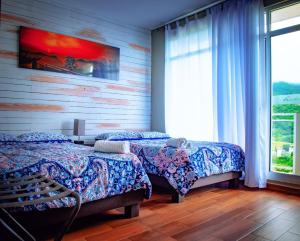 Postel nebo postele na pokoji v ubytování Hotel Real de Lua