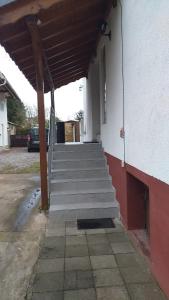 a group of stairs leading to a building at Ferienwohnung Fam.Lutz in Knittelsheim