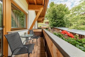 Balkón nebo terasa v ubytování Kräuterhotel Hochzillertal