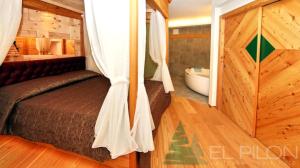 Hotel El Pilon客房内的一张或多张床位