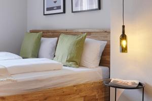 Postel nebo postele na pokoji v ubytování homie stay Julius Apartments - Iphofen