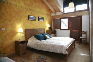 Säng eller sängar i ett rum på Casa Rural Ecológica Arrizurieta