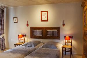 Postel nebo postele na pokoji v ubytování Gîte La Glycine