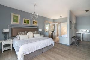 Postel nebo postele na pokoji v ubytování Overmeer Guest House
