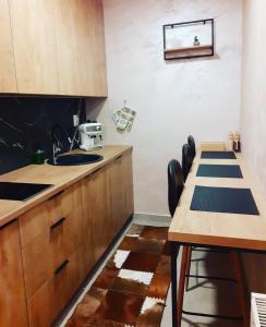 Kuchyň nebo kuchyňský kout v ubytování Apartman Planinski Kutak