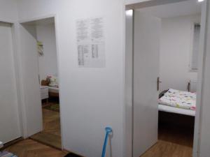Rúm í herbergi á Apartman Linera