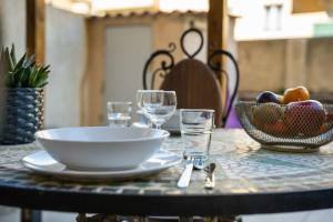 Restaurant ou autre lieu de restauration dans l'établissement Bain de Soleil ! Terrasse Clim Wifi Netflix