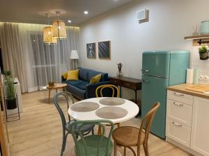Kuchyňa alebo kuchynka v ubytovaní Apartament Premium IV z Garażem