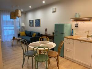Kuchyňa alebo kuchynka v ubytovaní Apartament Premium IV z Garażem