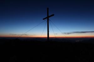 The sunrise or sunset as seen from a vendégházakat or nearby