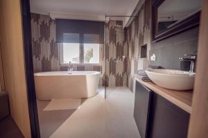 Koupelna v ubytování SZUR Home + 14 fotografií