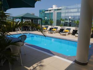 a swimming pool on the roof of a building at Hotel Boulevard in Lima