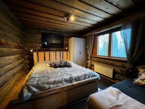 Una cama o camas en una habitación de Rukan Villa Kelotar (Mountain view)