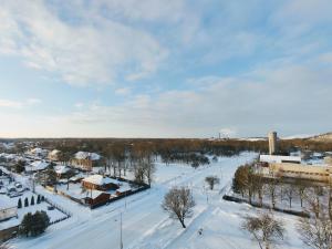 an aerial view of a town in the snow at Kotkapesa Apartment in Kiviõli