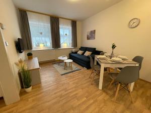 Telewizja i/lub zestaw kina domowego w obiekcie Apartmány Herc