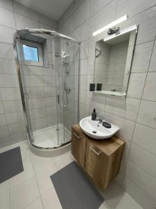 Łazienka w obiekcie Apartmány Herc