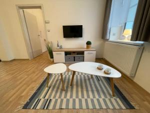 Telewizja i/lub zestaw kina domowego w obiekcie Apartmány Herc