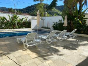 Swimmingpoolen hos eller tæt på Juquehy Casa para Famílias em condomínio