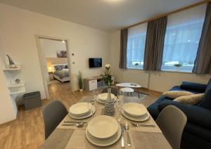 Telewizja i/lub zestaw kina domowego w obiekcie Apartmány Herc